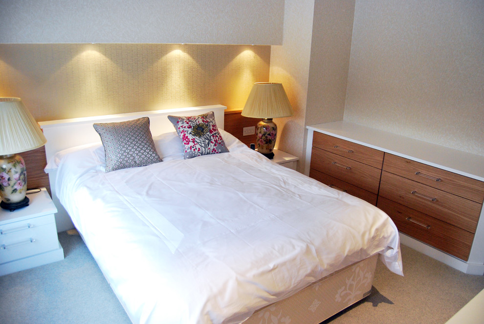 Small contemporary guest bedroom in Manchester with carpet.