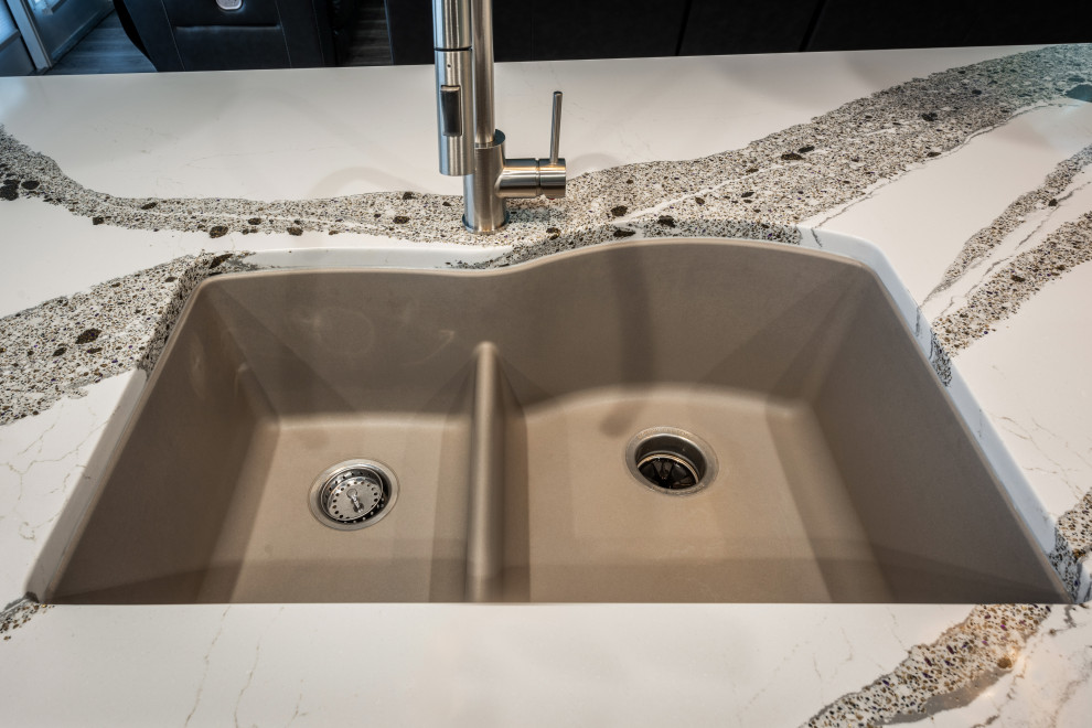 Example of a huge transitional single-wall vinyl floor and gray floor eat-in kitchen design in Orlando with an undermount sink, recessed-panel cabinets, gray cabinets, quartz countertops, white backsplash, porcelain backsplash, stainless steel appliances, an island and white countertops