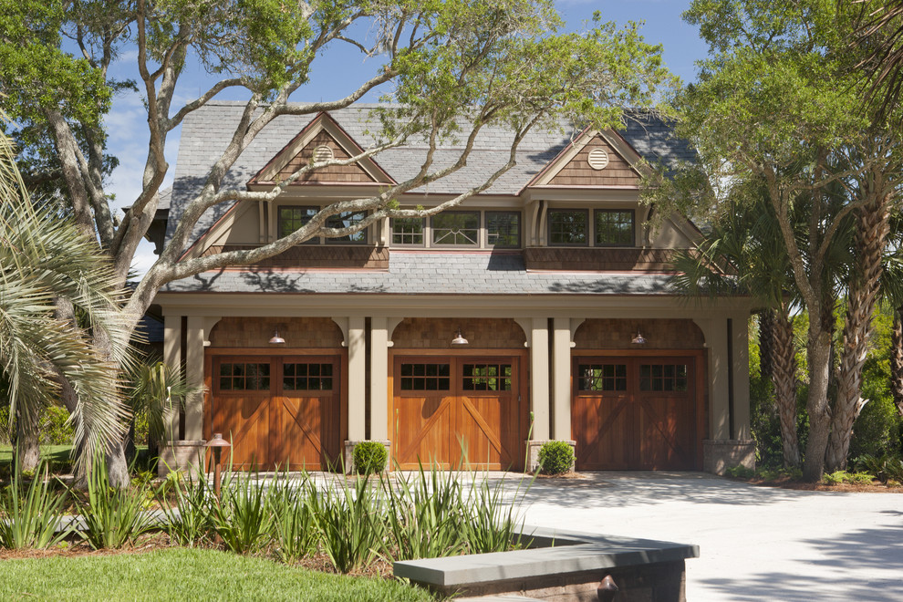 Design ideas for a large traditional detached three-car garage in Charleston.