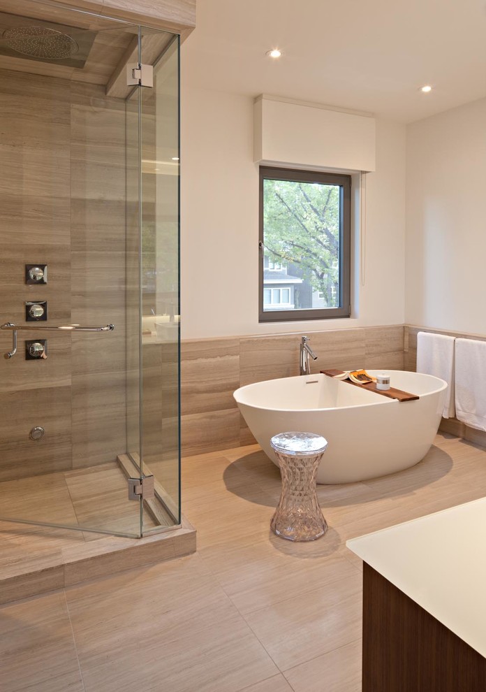 Mid-sized modern master bathroom in Calgary with flat-panel cabinets, dark wood cabinets, a freestanding tub, a corner shower, beige tile, porcelain tile, white walls, porcelain floors, glass benchtops, white floor and a hinged shower door.