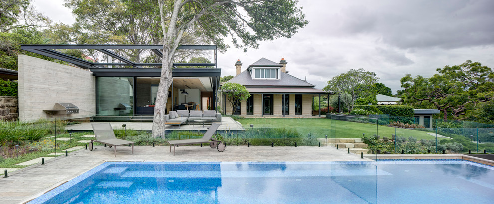 Large modern beige house exterior in Sydney.
