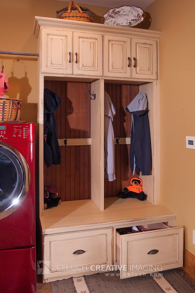 This is an example of a country laundry room in Cleveland.