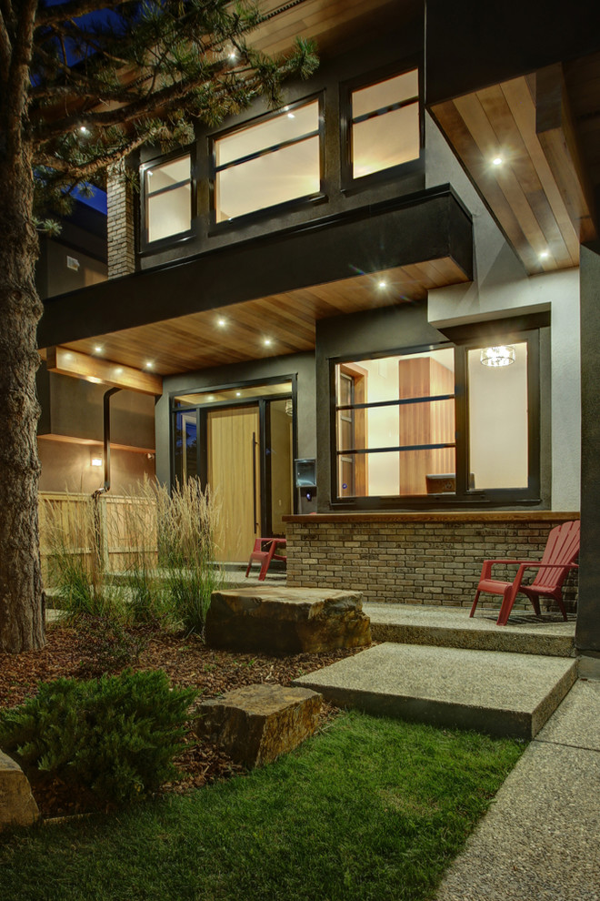 Transitional home design photo in Calgary