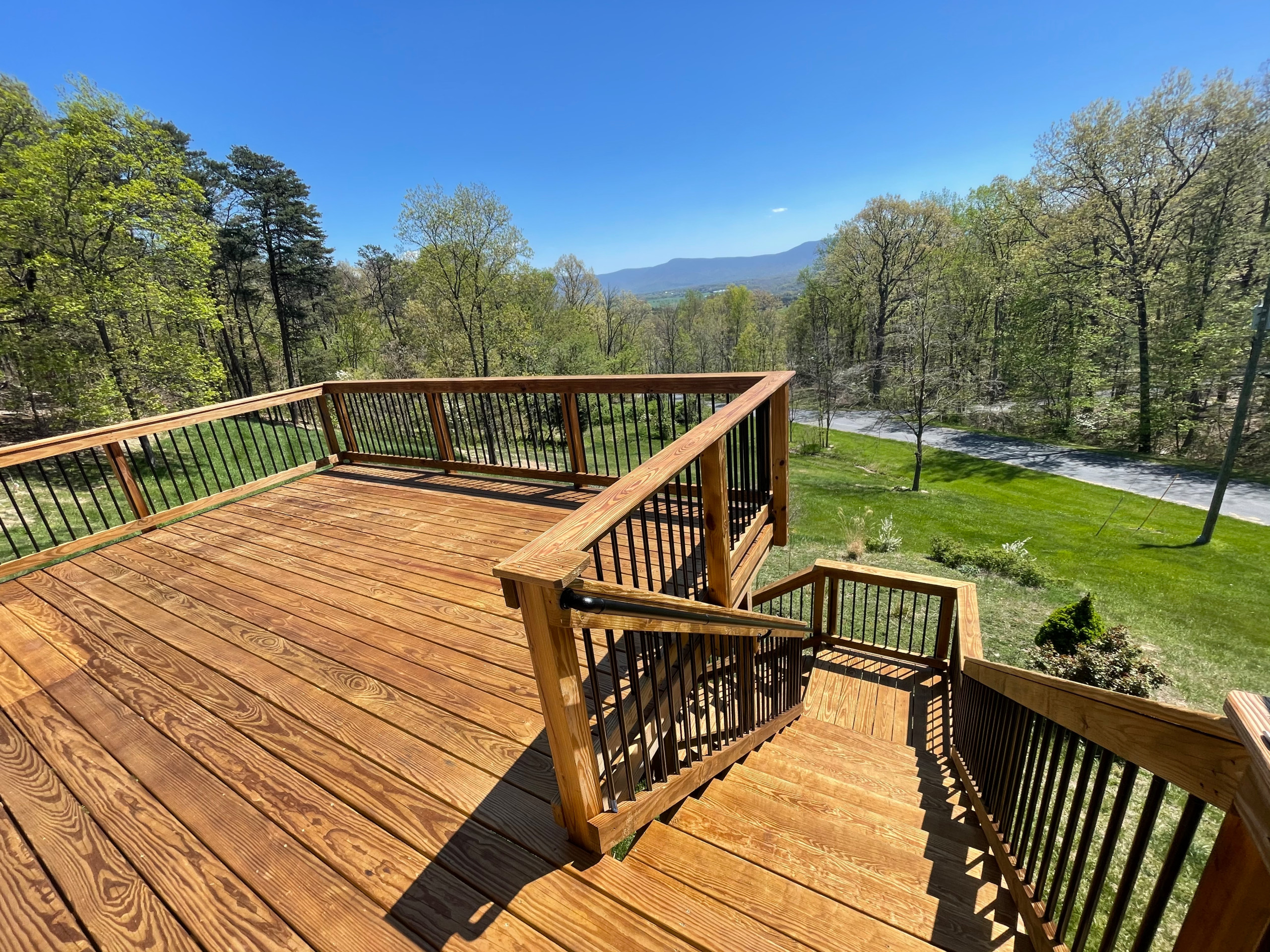 Deck stain and gutters power wash