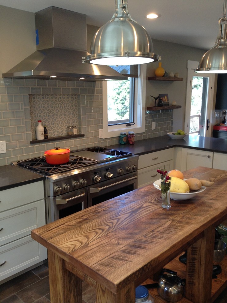Example of a transitional kitchen design in Denver