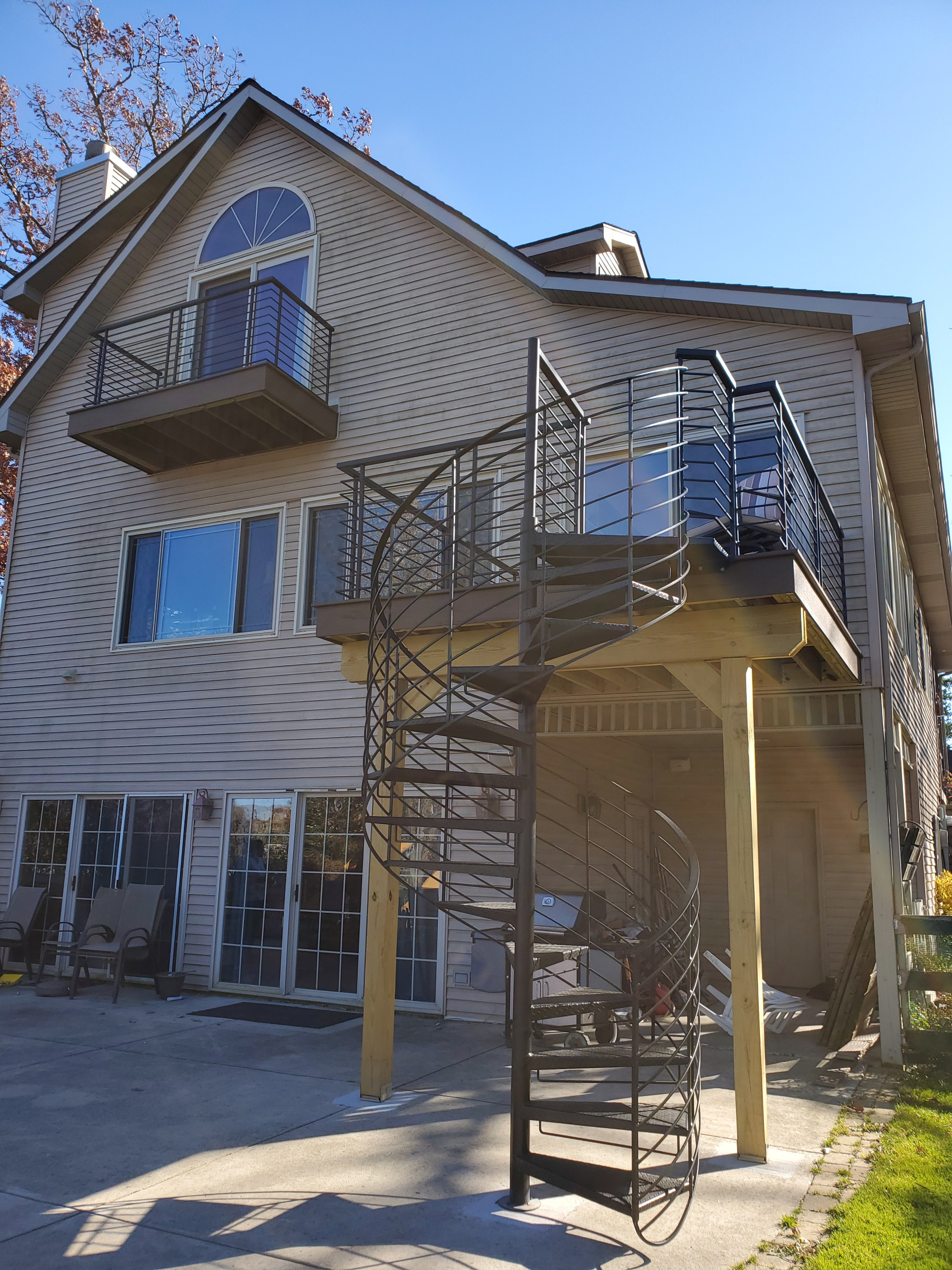 Composite deck with spiral staircase