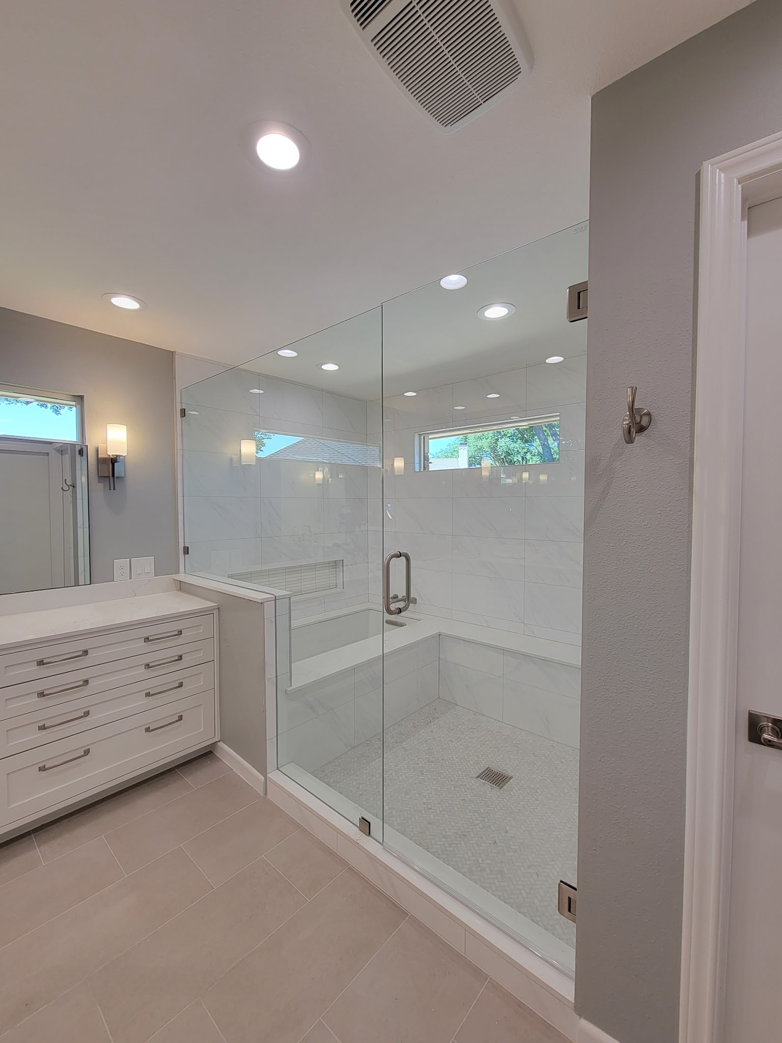 Two separate bathrooms converted into a master bathroom with a big open closet