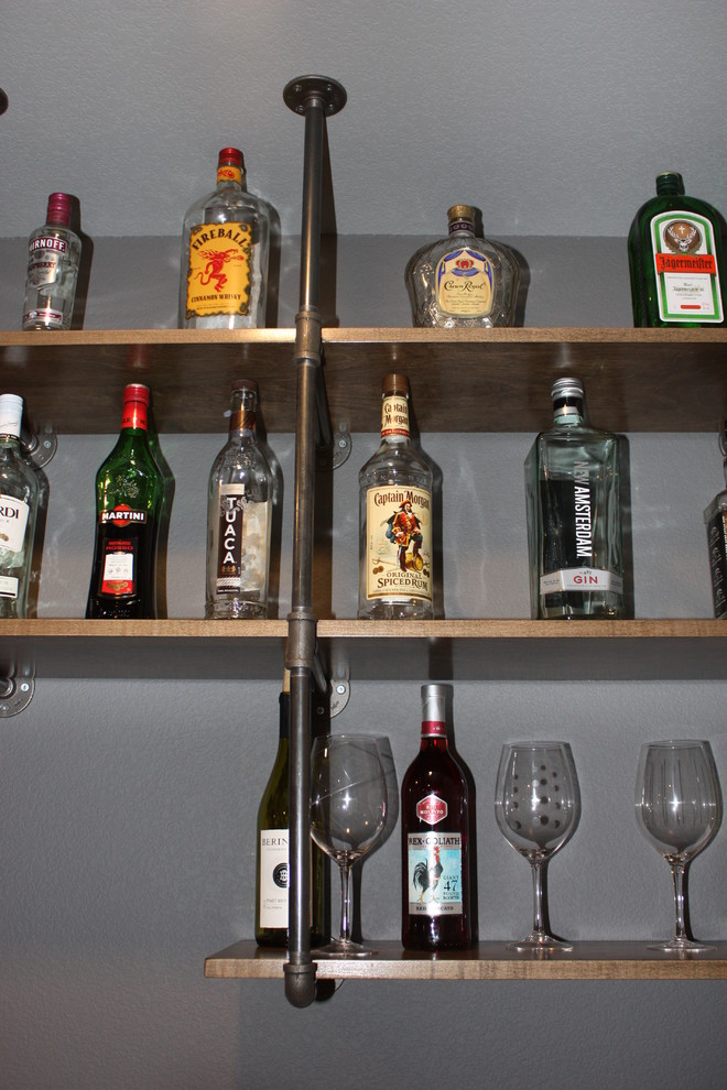 Photo of a mid-sized traditional home bar in Other.