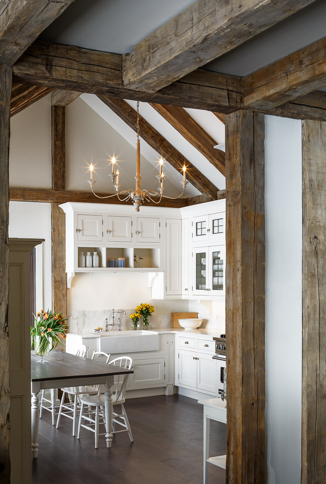 Inspiration for a small country kitchen in Ottawa with white cabinets, white splashback, stainless steel appliances, dark hardwood floors and no island.