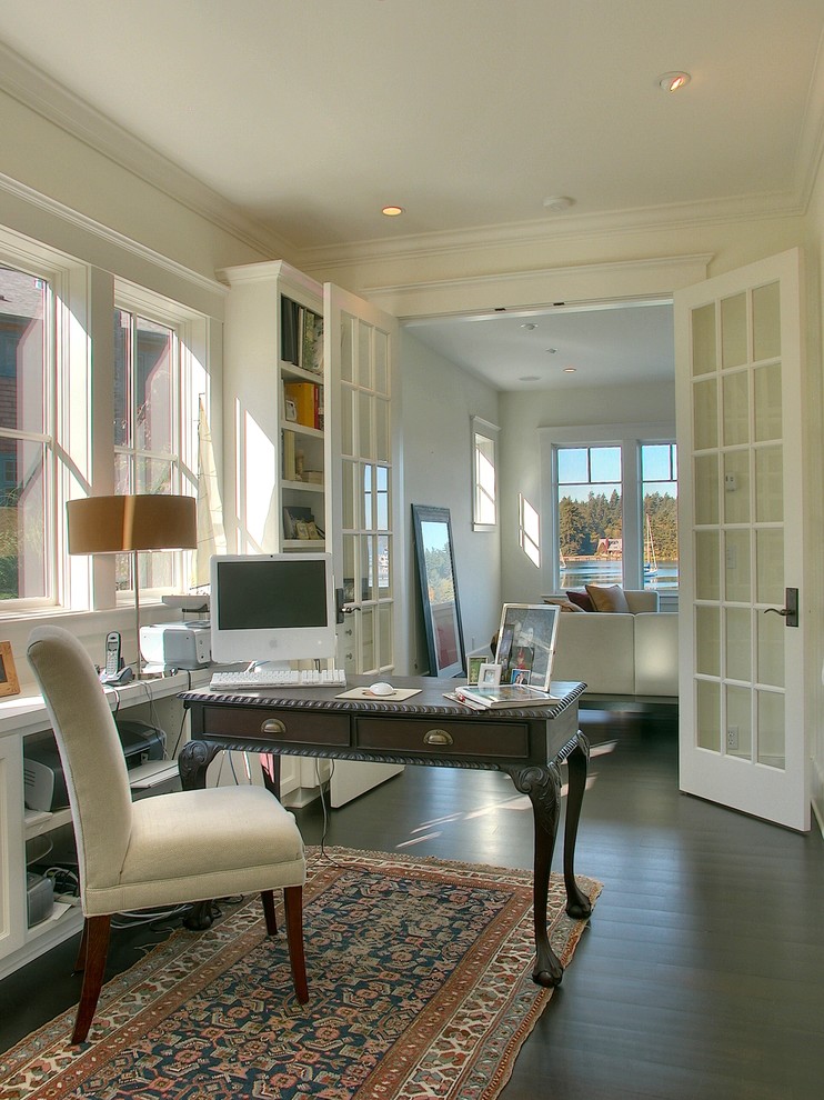 Inspiration for a traditional home office in Seattle with white walls, dark hardwood floors and a freestanding desk.