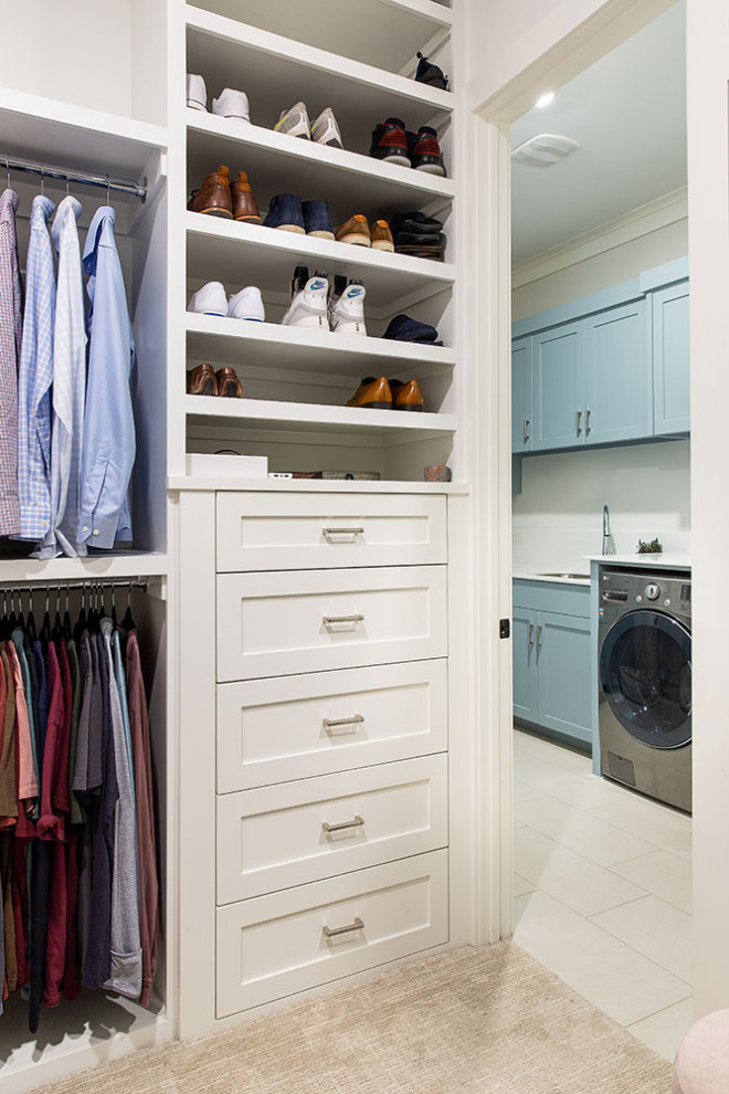 Example of a transitional closet design in Dallas