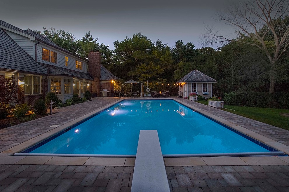 This is an example of a mid-sized traditional pool in Chicago.