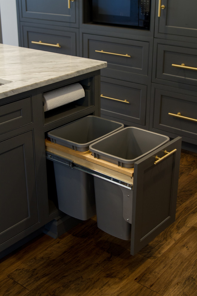 Eat-in kitchen - transitional medium tone wood floor and brown floor eat-in kitchen idea with beaded inset cabinets, gray cabinets, white backsplash, paneled appliances, an island and white countertops