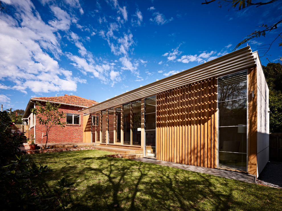 This is an example of a modern exterior in Melbourne with wood siding.