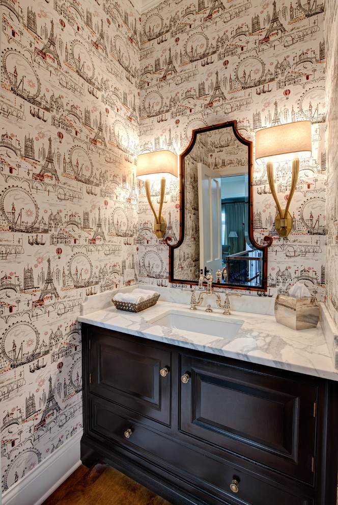 This is an example of a traditional powder room in Chicago with an undermount sink.