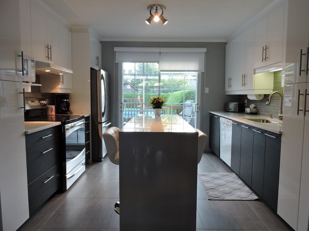 Design ideas for a mid-sized modern galley eat-in kitchen in Montreal with an integrated sink, flat-panel cabinets, white cabinets, quartz benchtops, grey splashback, cement tile splashback, stainless steel appliances, ceramic floors and with island.