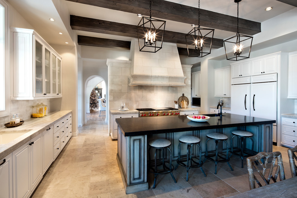 Inspiration for a huge transitional galley open concept kitchen remodel in Austin with an undermount sink, raised-panel cabinets, white cabinets, granite countertops and an island