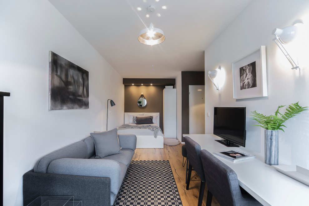Design ideas for a midcentury living room in Dusseldorf.