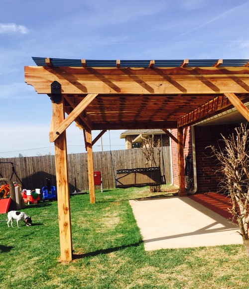 10x20 pergola with polycarbonate roofing and decorative hardware!