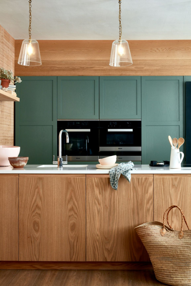 Inspiration for a mid-sized transitional kitchen in Other with shaker cabinets and a peninsula.