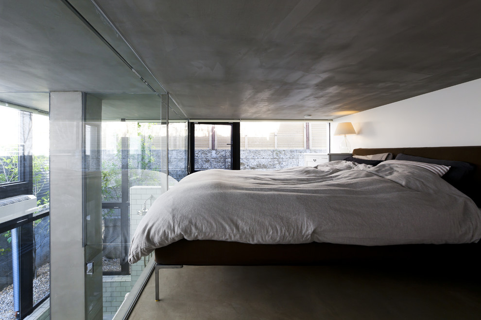 Contemporary loft-style bedroom in Tokyo.