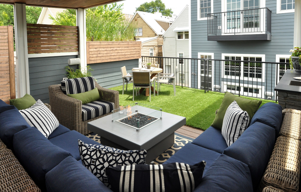 Outdoor kitchen deck - large transitional rooftop outdoor kitchen deck idea in Chicago with a pergola