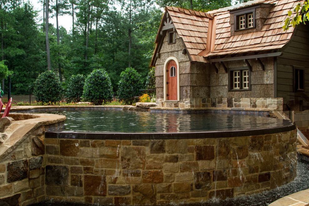 Inspiration for a rustic round aboveground pool remodel