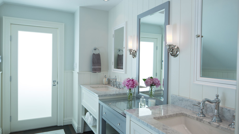 Photo of a large transitional master bathroom in New York with open cabinets, white cabinets, grey walls, an undermount sink and marble benchtops.