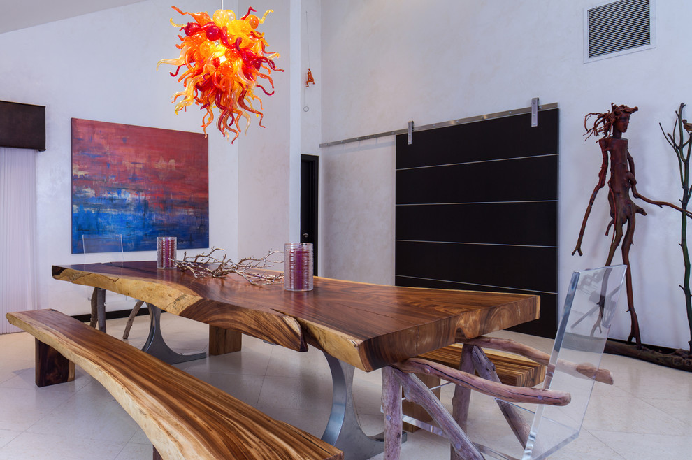 Example of a trendy ceramic tile dining room design in Orlando