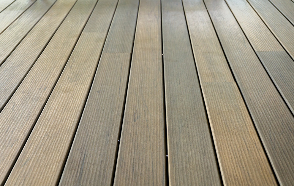 Large mountain style backyard balcony deck photo in Austin