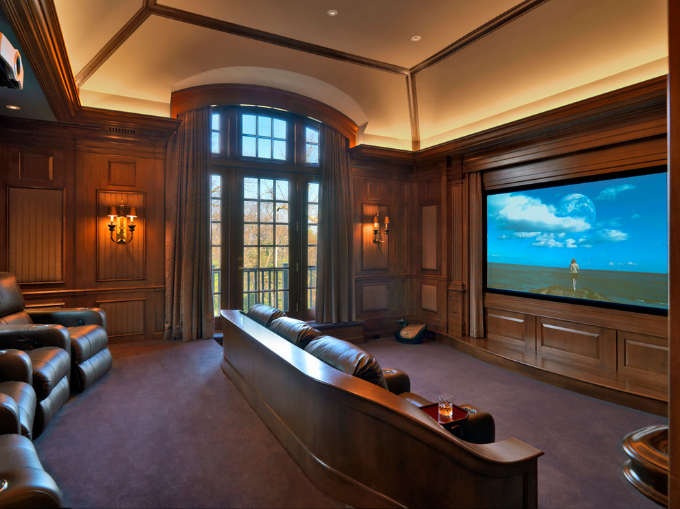 Inspiration for a traditional home theatre in Boston with a projector screen and purple floor.