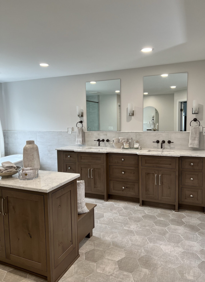 Freestanding bathtub - large transitional white tile and porcelain tile porcelain tile, gray floor and double-sink freestanding bathtub idea in Cincinnati with medium tone wood cabinets, an undermount sink, quartz countertops, a hinged shower door, white countertops and a built-in vanity