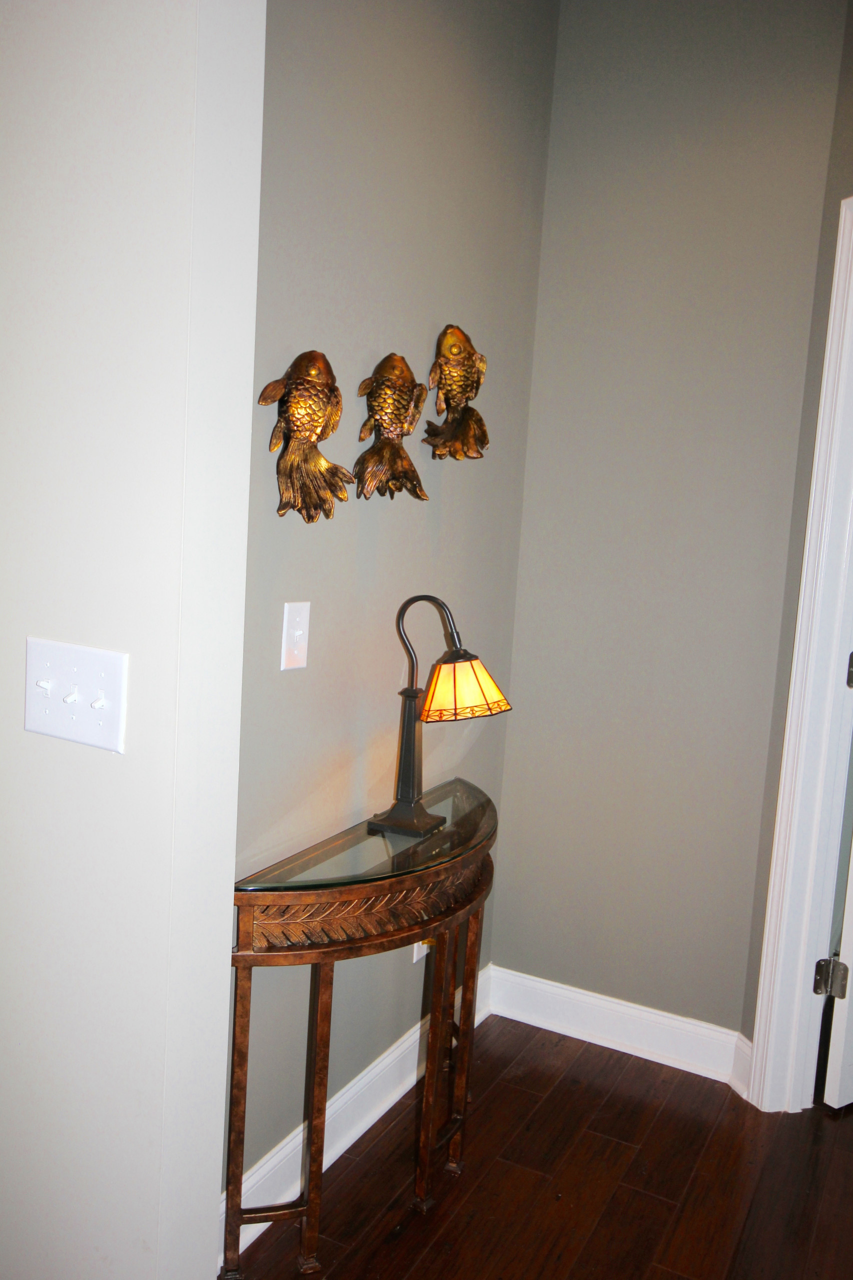 Darker accent paint was added in the hall to master bedroom and dining room wall