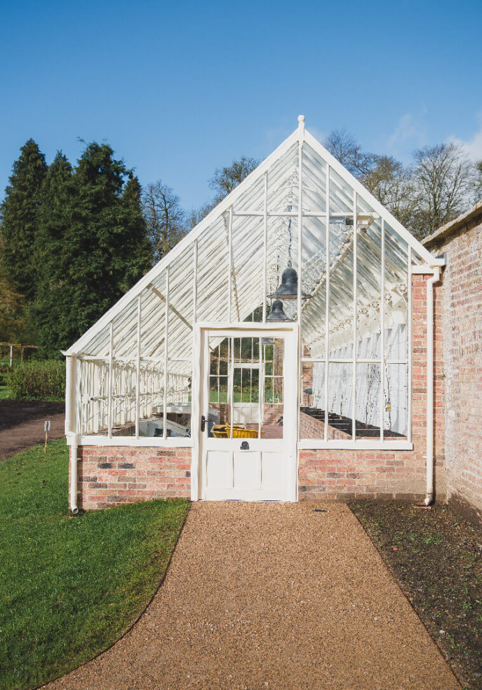 Photo of a large traditional attached greenhouse in Other.