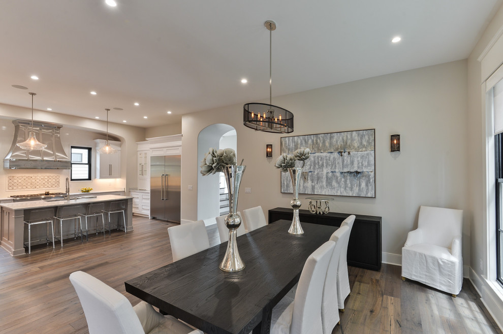 Kitchen/dining room combo - large transitional light wood floor kitchen/dining room combo idea in Louisville with gray walls and no fireplace