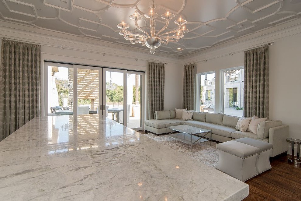 Example of a large transitional open concept dark wood floor and brown floor living room design in Dallas with white walls, no fireplace and no tv