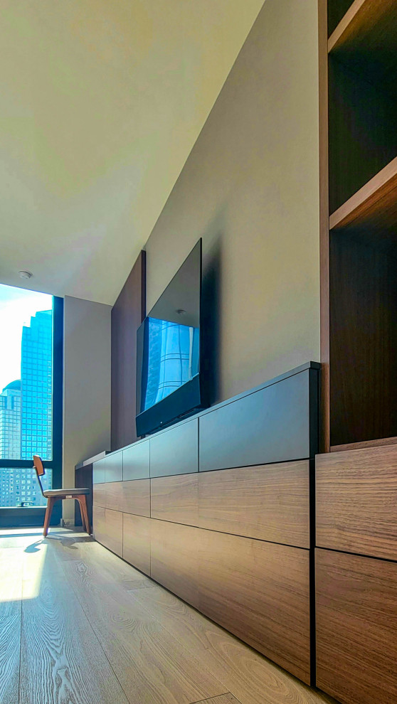 This is an example of a large contemporary storage and wardrobe in New York.