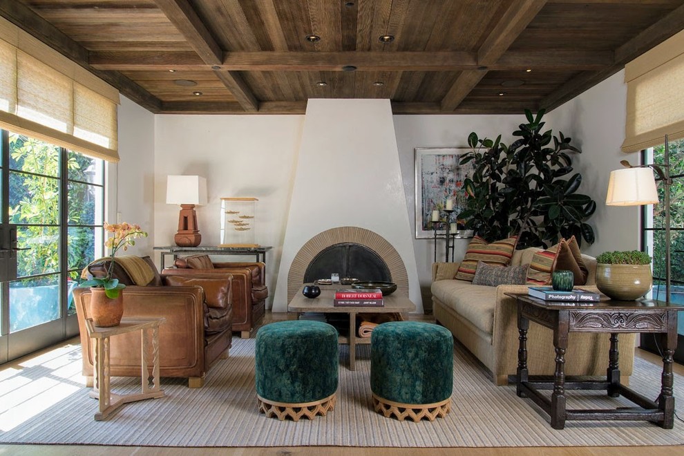 Inspiration for a mid-sized eclectic family room in Los Angeles with white walls.