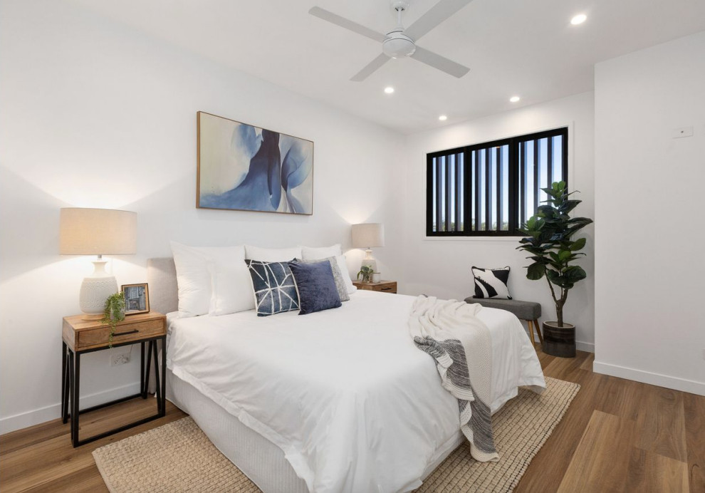 This is an example of a mid-sized contemporary master bedroom in Gold Coast - Tweed.