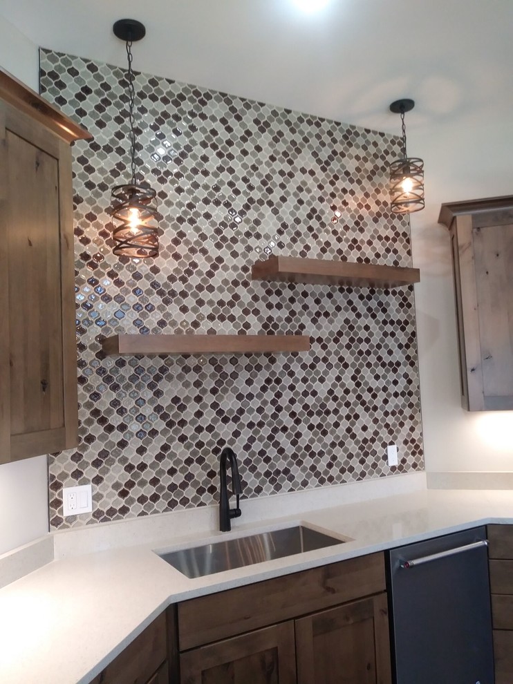 Inspiration for a rustic kitchen remodel in Chicago with an island