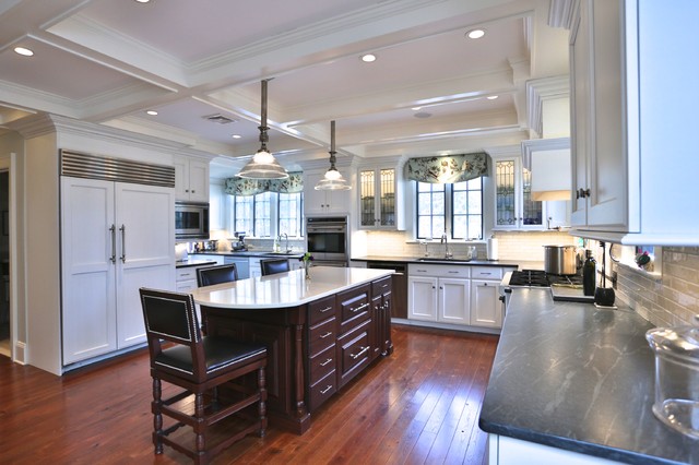 Kitchen With White Cabinets And Coffered Ceiling