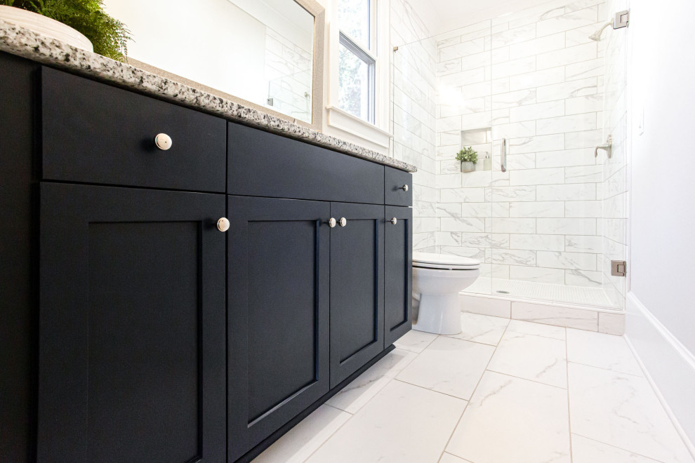 Design ideas for a medium sized traditional family bathroom in Atlanta with shaker cabinets, black cabinets, an alcove shower, white tiles, porcelain tiles, a submerged sink, granite worktops, a hinged door, white worktops, a single sink and a built in vanity unit.