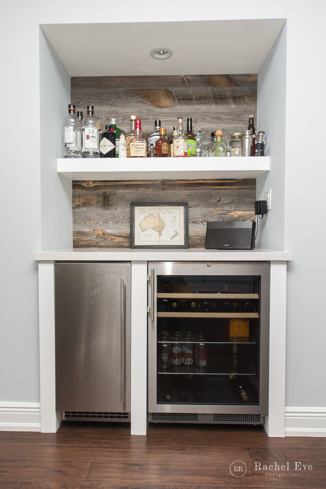 Photo of a transitional home bar in Miami.