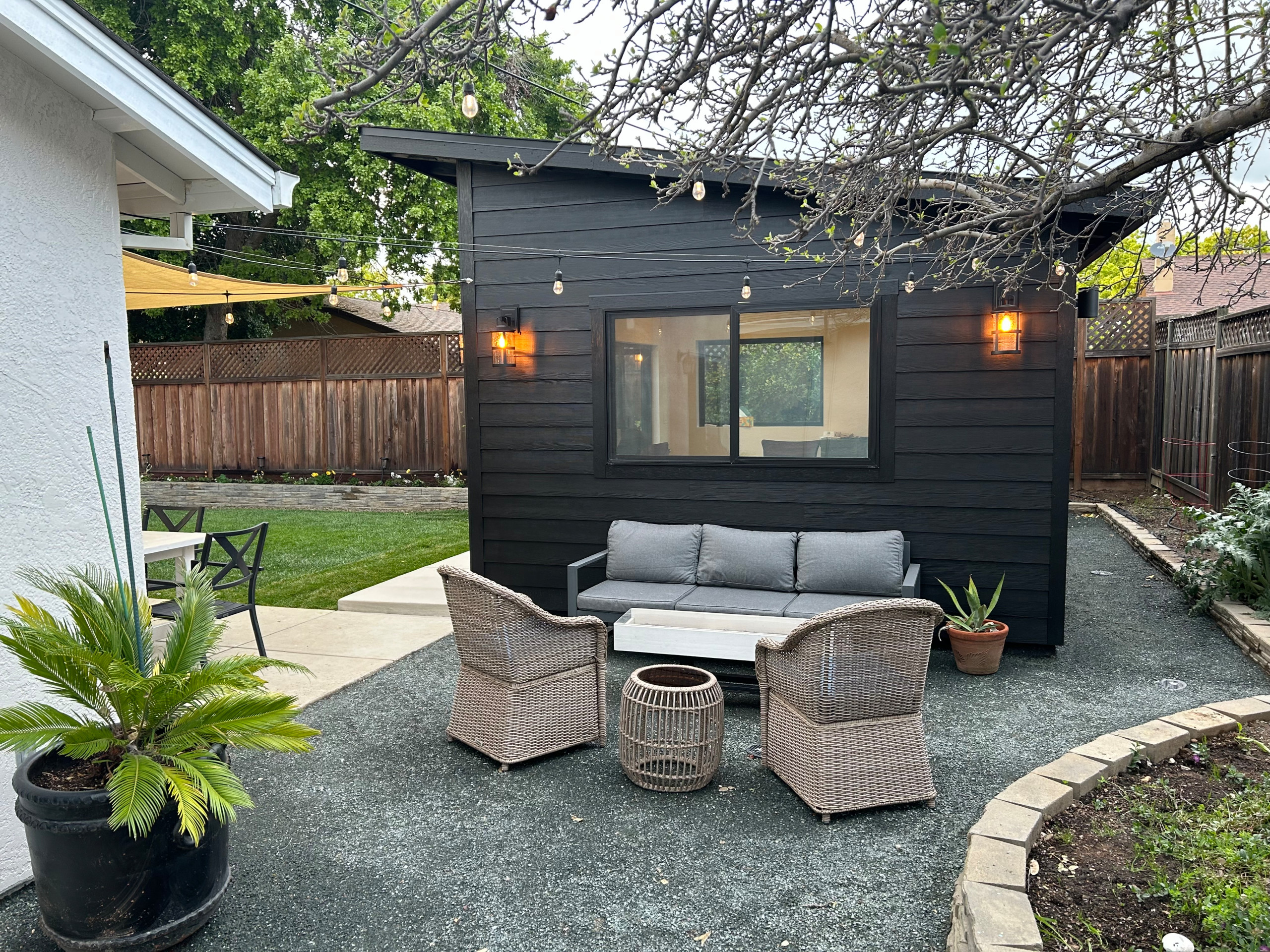 Small minimalist detached shed photo in Other