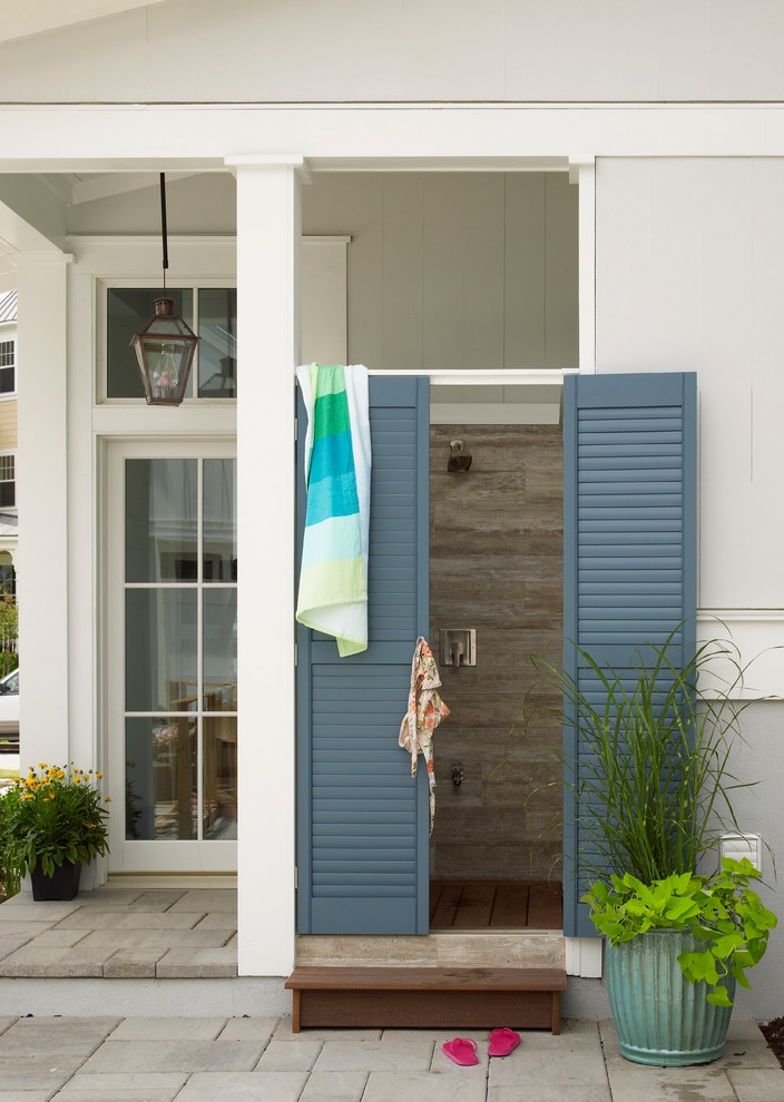 Beach style patio in Charleston with an outdoor shower.