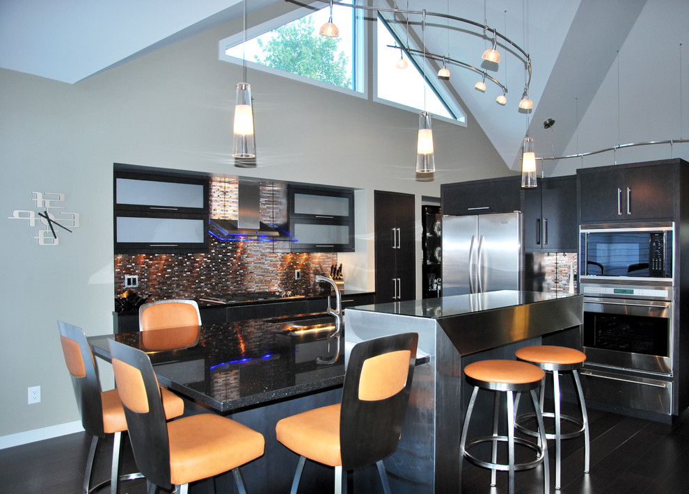 This is an example of a mid-sized contemporary l-shaped separate kitchen in Other with an undermount sink, flat-panel cabinets, black cabinets, granite benchtops, multi-coloured splashback, matchstick tile splashback, stainless steel appliances, dark hardwood floors, with island and black floor.