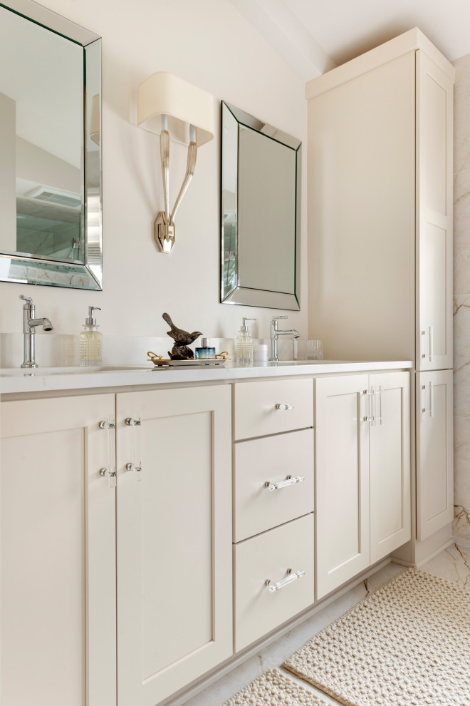 Alcove shower - mid-sized transitional multicolored tile and porcelain tile porcelain tile, multicolored floor, double-sink and vaulted ceiling alcove shower idea in Minneapolis with shaker cabinets, beige cabinets, a bidet, white walls, an undermount sink, quartz countertops, a hinged shower door, white countertops and a built-in vanity