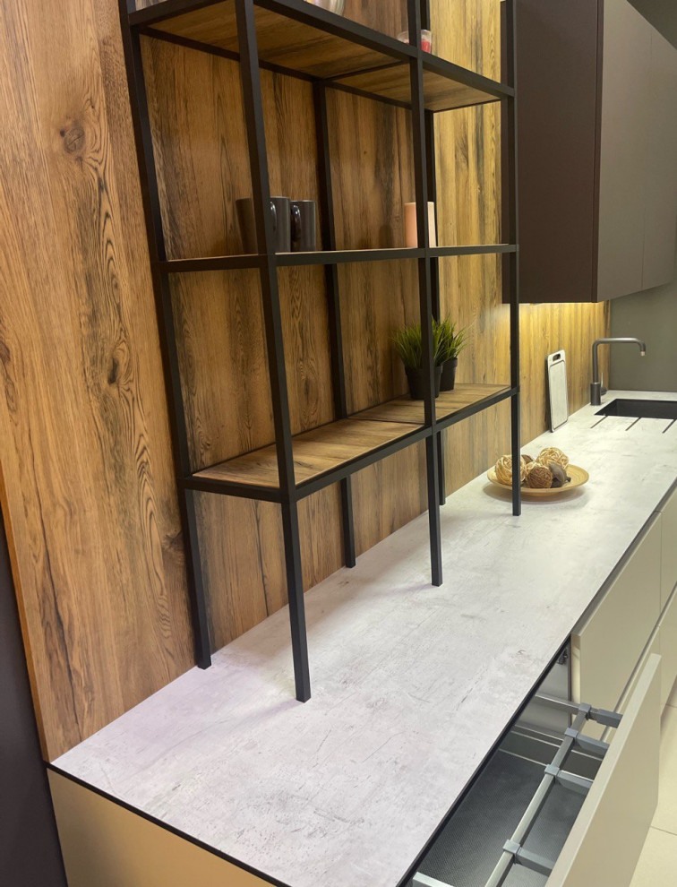 This is an example of a large scandinavian single-wall kitchen in New York with a drop-in sink, quartz benchtops, brown splashback, porcelain floors, with island, white floor and white benchtop.