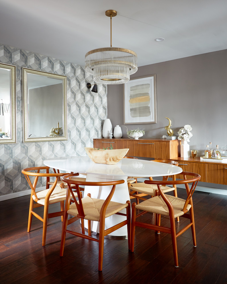 This is an example of a contemporary dining room in Philadelphia with grey walls, dark hardwood floors and brown floor.