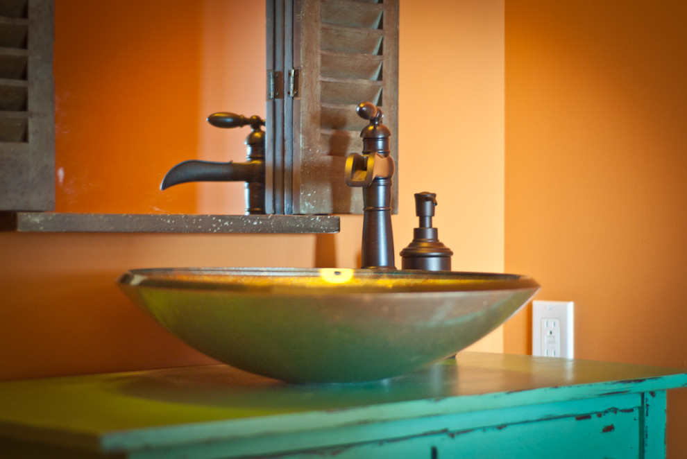 Inspiration for an arts and crafts bathroom in Grand Rapids with a vessel sink and turquoise cabinets.